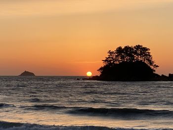Scenic view of sea against sky during sunset