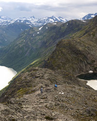 Scenic view of besseggen by lake