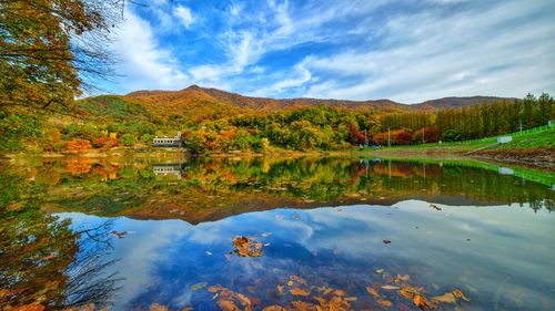 Scenic view of lake against sky during autumn