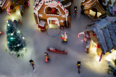 Christmas gingerbread village with fog from dry ice