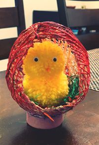 Close-up of a bird toys on table