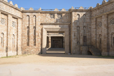 Exterior of historic building against sky