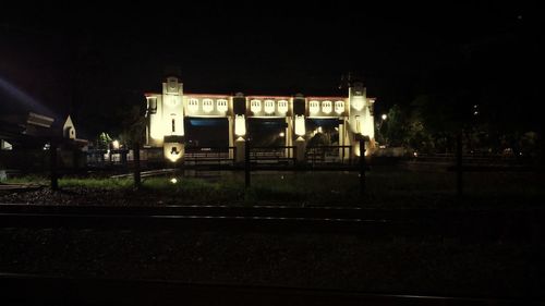 Railroad station platform at night