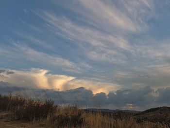 Scenic view of landscape against sky during sunset