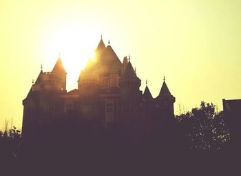 View of temple against sky at sunset