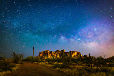 Scenic view of star field against sky at night