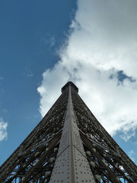 Low angle view of building against cloudy sky