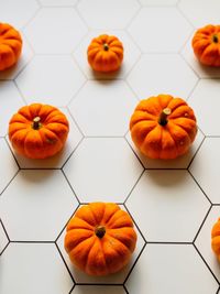 High angle view of orange pumpkins on floor