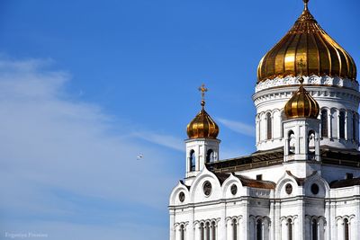 Low angle view of building against blue sky