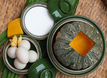 High angle view of eggs in jar on table