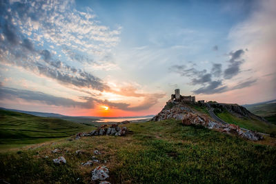 Scenic view of landscape against sky during sunset