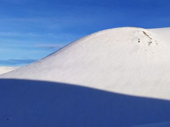 Low angle view of snow covered land