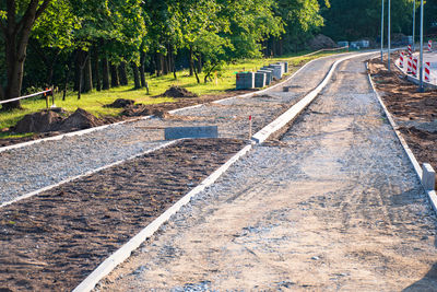 Building a new bike path with sidewalk, bicycle road under construction