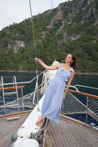 Woman leaning on boat