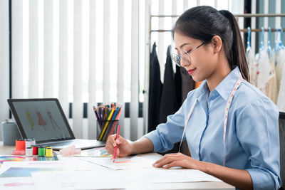 Businesswoman working at office