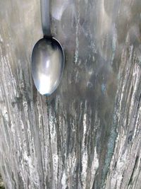 Close-up of crystal ball on metal