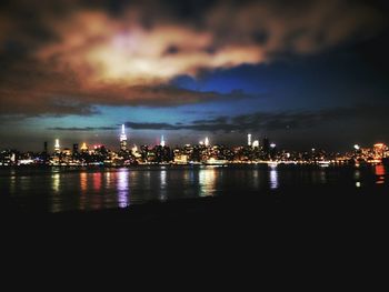 Illuminated cityscape at night