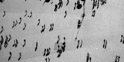 High angle view of people walking on city square at neumarkt
