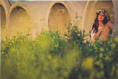 Young woman sitting outdoors