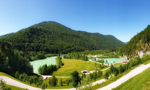 Scenic view of mountains against clear blue sky