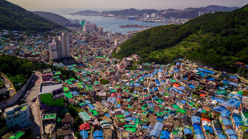 High angle view of cityscape by sea