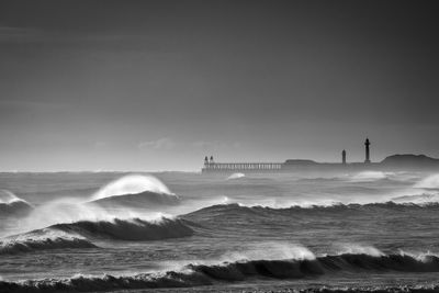 Scenic view of sea against sky whitby rough seas
