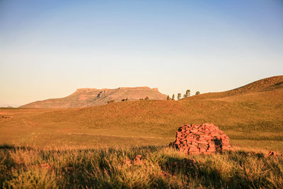 Scenic view of rock formations against sky