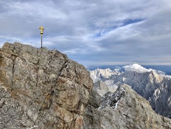 Rock formations on mountain against sky