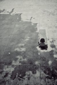 High angle view of person shadow on footpath