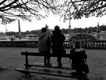 Rear view of woman standing in park