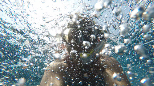 Close-up of water splashing in sea