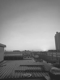 High angle view of buildings against clear sky