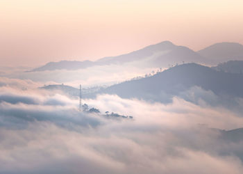 Low angle view of mountains against sky during sunset