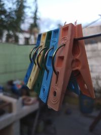 Close-up of clothes hanging on clothesline