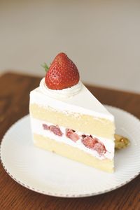 Close-up of strawberry cake on plate