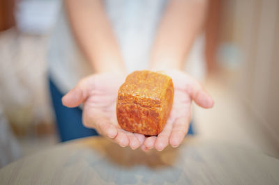 Close-up of woman holding ice cream