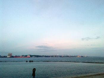 View of calm sea against cloudy sky