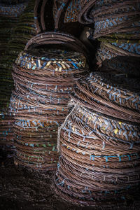 Close-up of stacked wicker baskets for sale