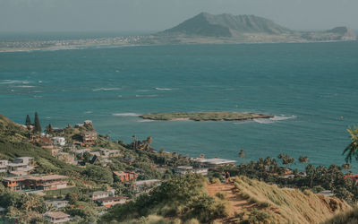 High angle view of townscape by sea