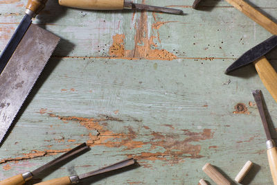 High angle view of various objects on wooden table