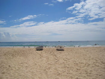 Scenic view of beach against sky