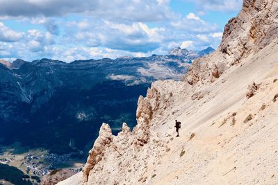 Full length of man standing on ridge against landscape