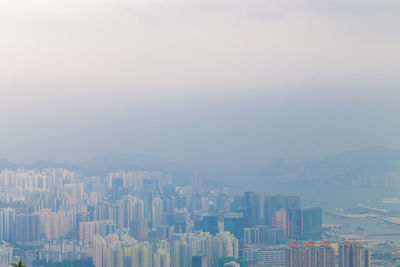 Modern buildings in city against sky