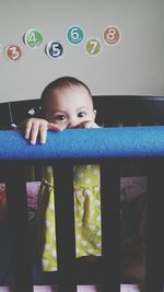 Cute boy playing at home