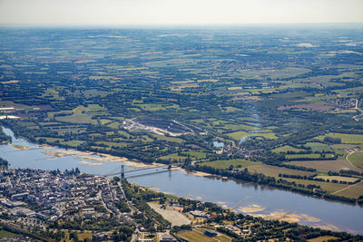 High angle view of river amidst buildings in city