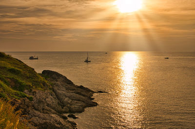 Scenic view of sea against sky during sunset