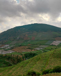 High angle view of agricultural field against sky