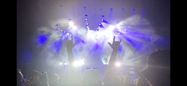 Crowd at music concert at night