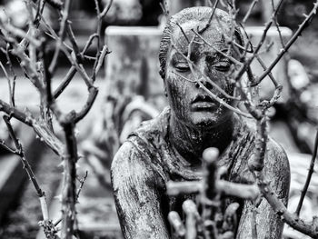 Close-up of statue at cemetery