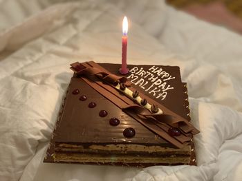 High angle view of candles on cake